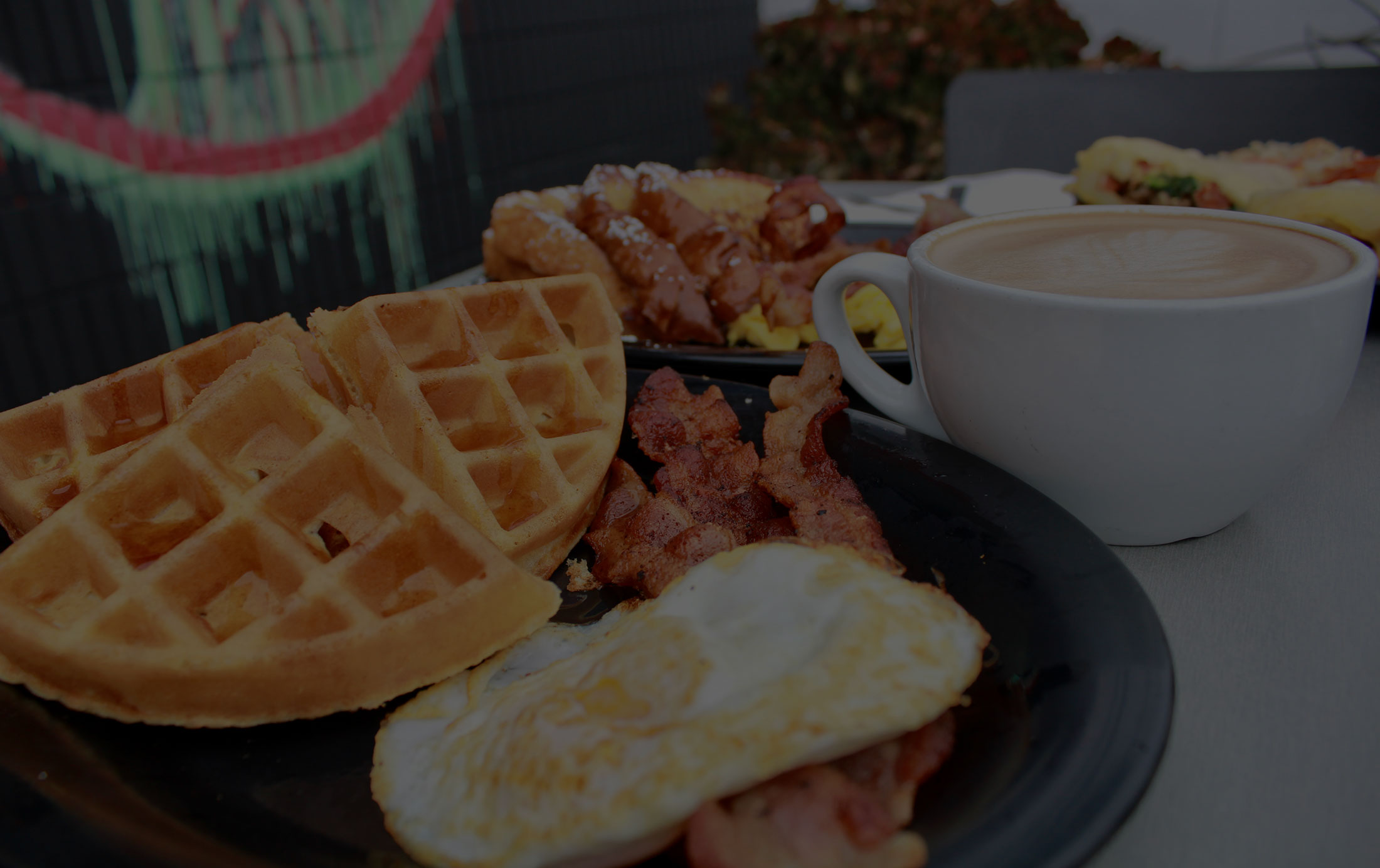 A breakfast spread served at Rooster Cafe